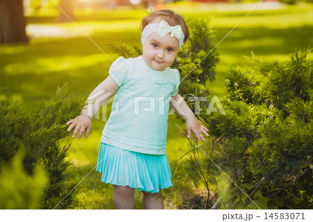 Cute baby are playing in the summer park Cute baby are playing in the summer park 14583071