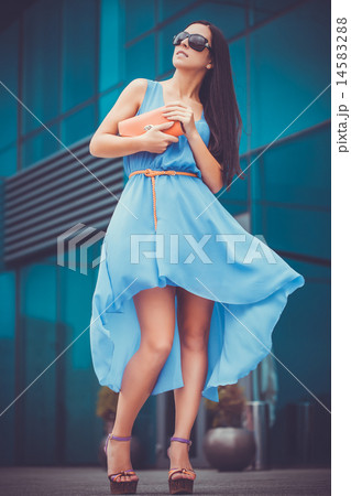 pretty woman is walking in the city 14583288