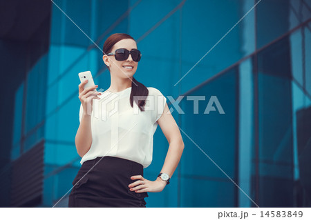 Successful businessman talking on cellphone. 14583849