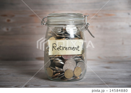 Money jar with retirement label. 14584880