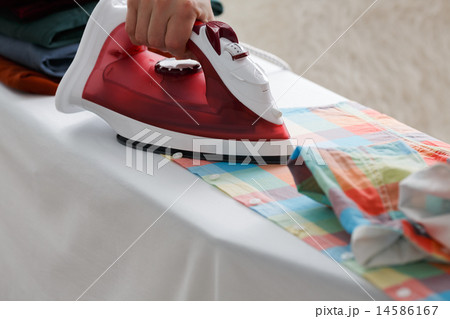 Ironing a shirt Ironing a shirt 14586167