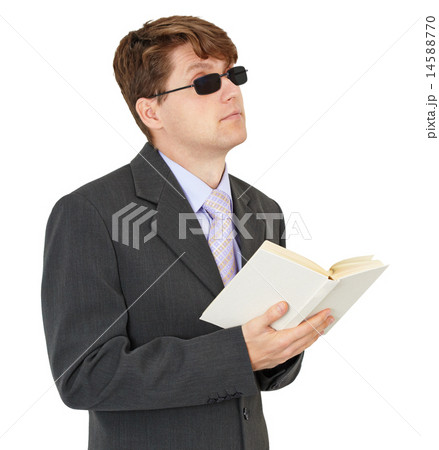 Blind young man with book isolated on white background Blind young man with book isolated on white background 14588770