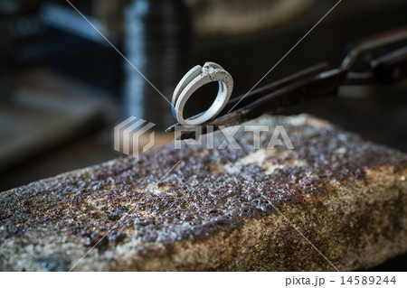 A wedding ring just after goldsmith work. A wedding ring just after goldsmith work. 14589244