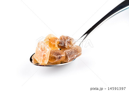 brown caramelized sugar in a wooden spoon 14591397