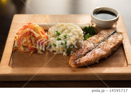 Grilled salmon with rice 14595717