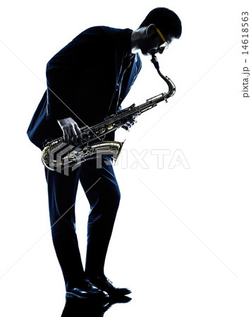 man saxophonist playing saxophone player  silhouette 14618563
