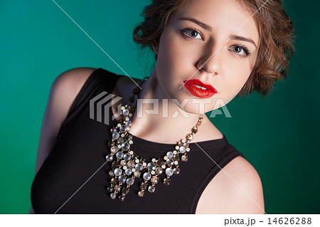 Portrait of beautiful young woman with evening make-up  14626288
