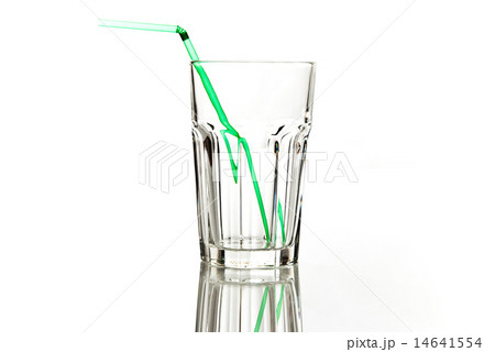 empty transparently glass with green straw 14641554