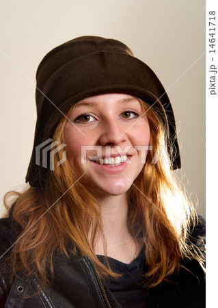 Smiling redhead in cloche hat and jacket 14641718
