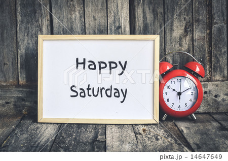 Happy Saturday message on white board and redclock Happy Saturday message on white board and redclock 14647649