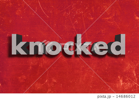 knocked word on red wall 14686012
