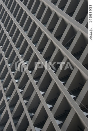 Skyscraper facade showing grid of concrete girders 14693953