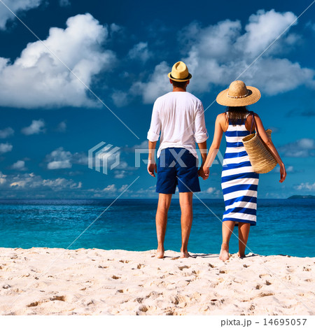 Couple on a beach at Seychelles 14695057
