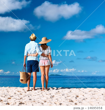 Couple on a beach at Seychelles 14695058
