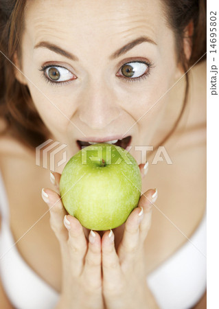 Woman with fresh apple Woman with fresh apple 14695802