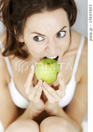 Woman with fresh apple 14695803