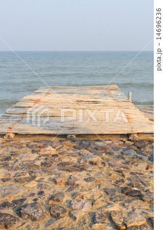 wooden pier to the sea and sky 14696236