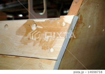 wooden boat building in Tasmanian wharf 14698738