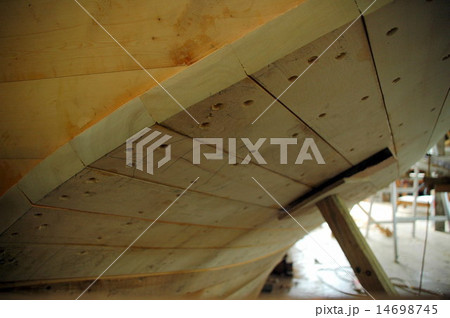 wooden boat building in Tasmanian wharf 14698745