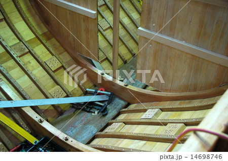wooden boat building in Tasmanian wharf 14698746