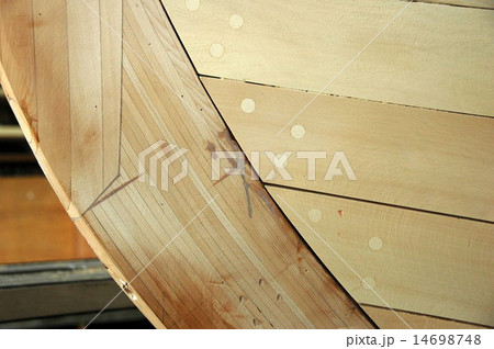 wooden boat building in Tasmanian wharf 14698748