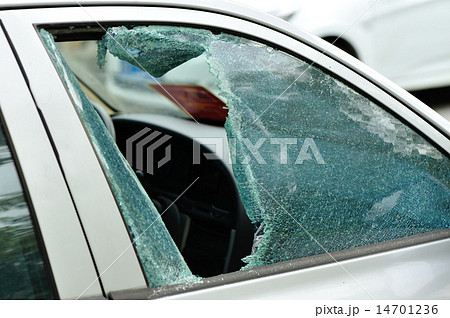 tock Photo: car window smashed by a thief tock Photo: car window smashed by a thief 14701236