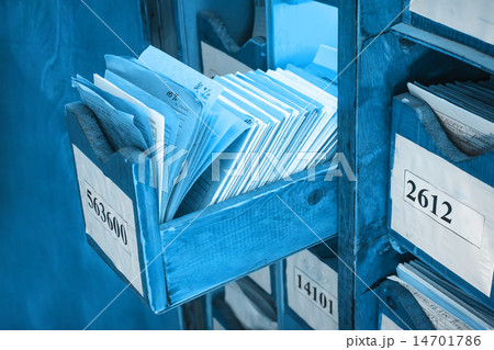 Paper documents stacked in archive 14701786