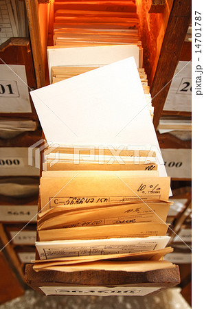 Paper documents stacked in archive Paper documents stacked in archive 14701787
