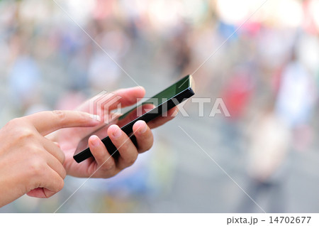 woman hands use smart phone in modern city woman hands use smart phone in modern city 14702677