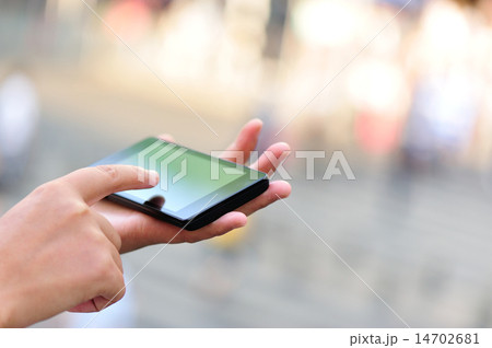 woman hands use smart phone in modern city woman hands use smart phone in modern city 14702681