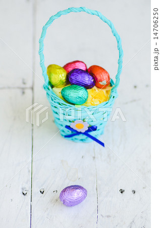 Chocolate easter eggs in a basket 14706250