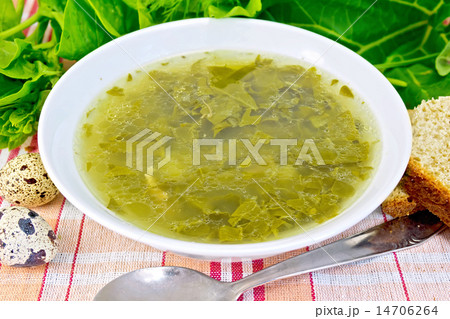 Soup of greenery on linen fabric 14706264