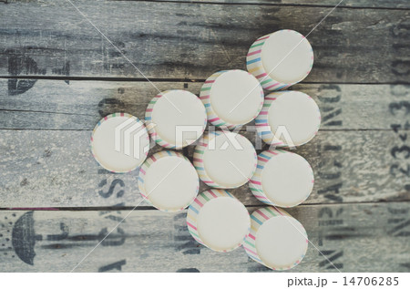 Empty paper cups stack on wooden background. 14706285