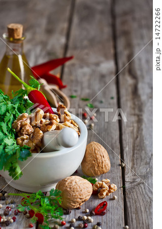 Cilantro and walnuts in a mortar 14722266