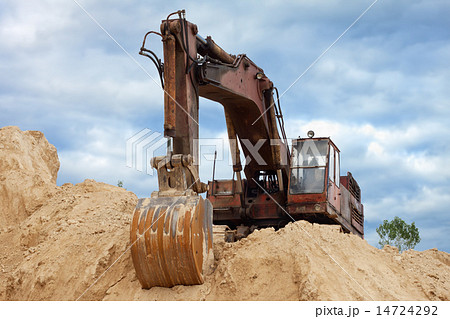 Dredge on a heap of sand 14724292