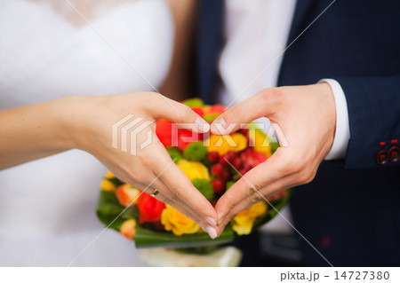 closeup of hands of bridal unrecognizable couple 14727380