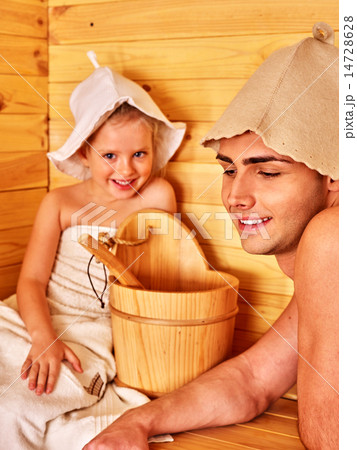 Family with child relaxing at sauna. Family with child relaxing at sauna. 14728628