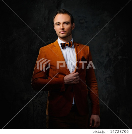 Sharp dressed fashionist wearing jacket and bow tie Sharp dressed fashionist wearing jacket and bow tie 14728706