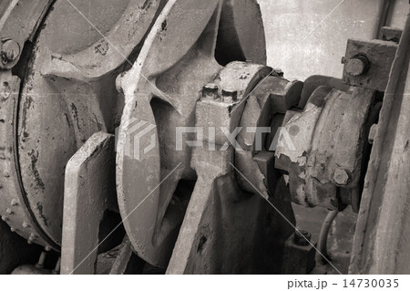 Closeup fragment of bow anchor winch on old ship 14730035