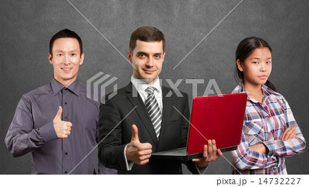 Asian team and male in suit with laptop in his hands Asian team and male in suit with laptop in his hands 14732227