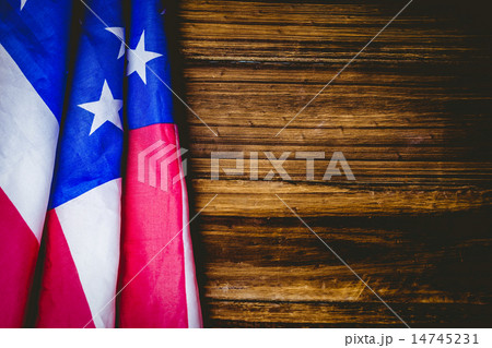 American flag on wooden table American flag on wooden table 14745231