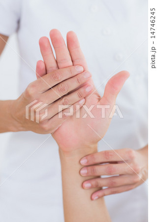 Physiotherapist doing hand massage 14746245