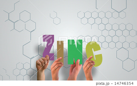 Composite image of hands holding up zinc 14746354