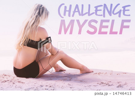 Composite image of fit blonde sitting in on the beach taking a b 14746413