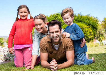 Happy family smiling at camera 14747169