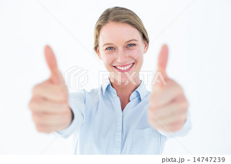 Smiling businesswoman looking at camera 14747239