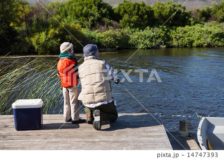 Happy man fishing with his son 14747393