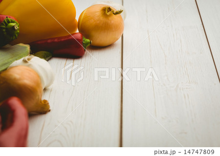 Vegetables laid out on table 14747809
