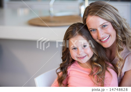 Father and daughter hugging 14748628