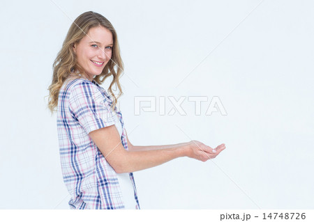 Pretty hipster presenting her hands Pretty hipster presenting her hands 14748726